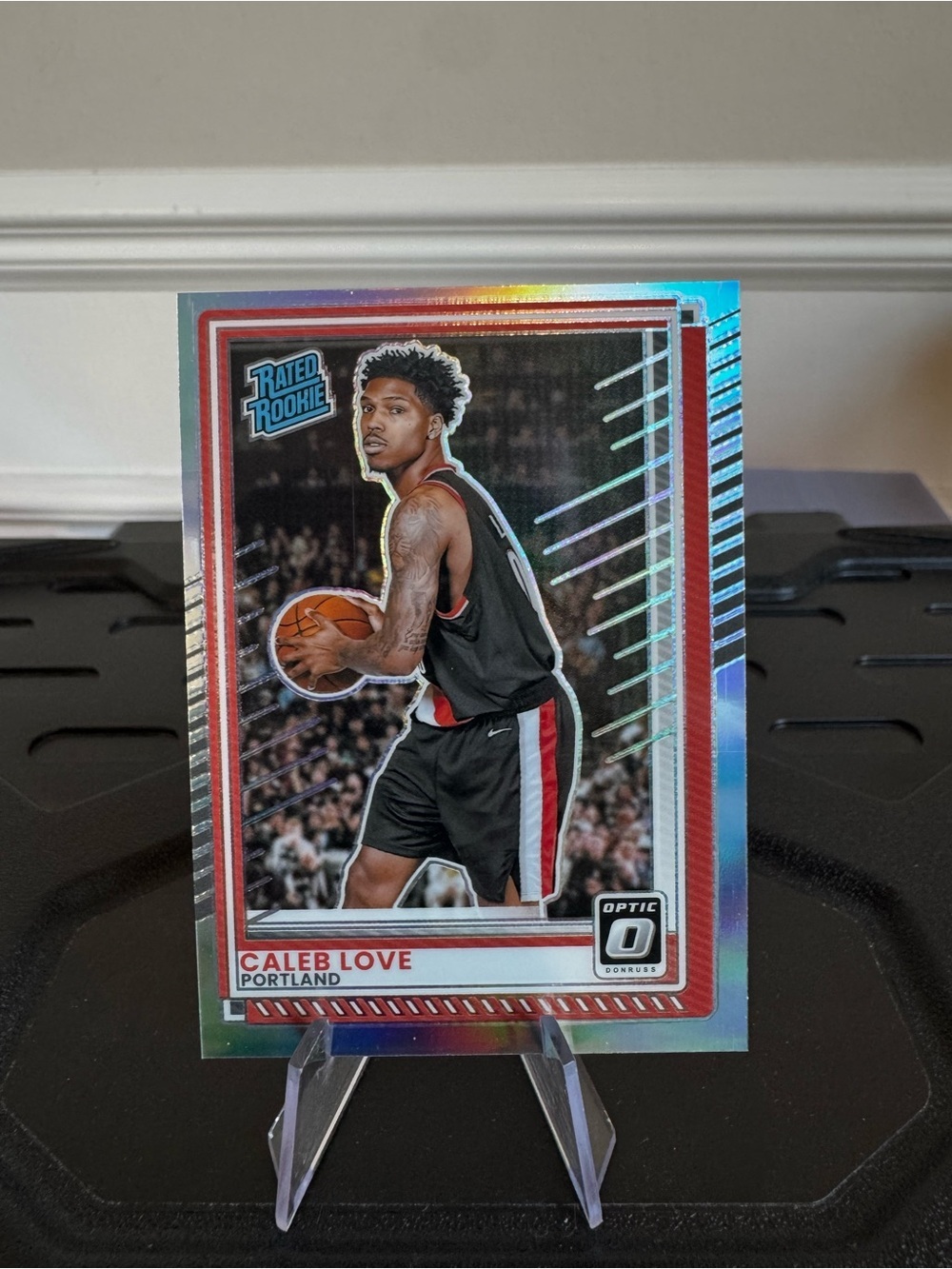 2025-26 Caleb Love Panini Donruss Optic Silver Prizm Rated Rookie. #trailblazers